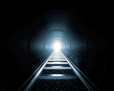 Light at the End of the Tunnel istock photo Moving into the light